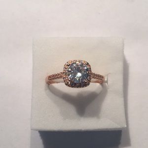 Rose gold plated, 1 carat topaz, CZ’s, size 10